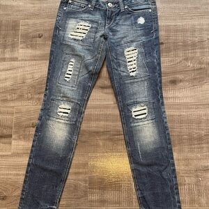Blue Skinny Jeans with Distressed Details